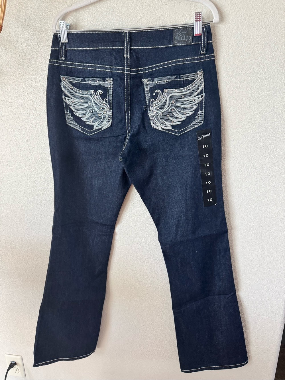 NWT Love Indigo Dark Indigo Jeans with Embellished Swan Design.